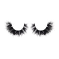 Pair of black false eyelashes on a white background