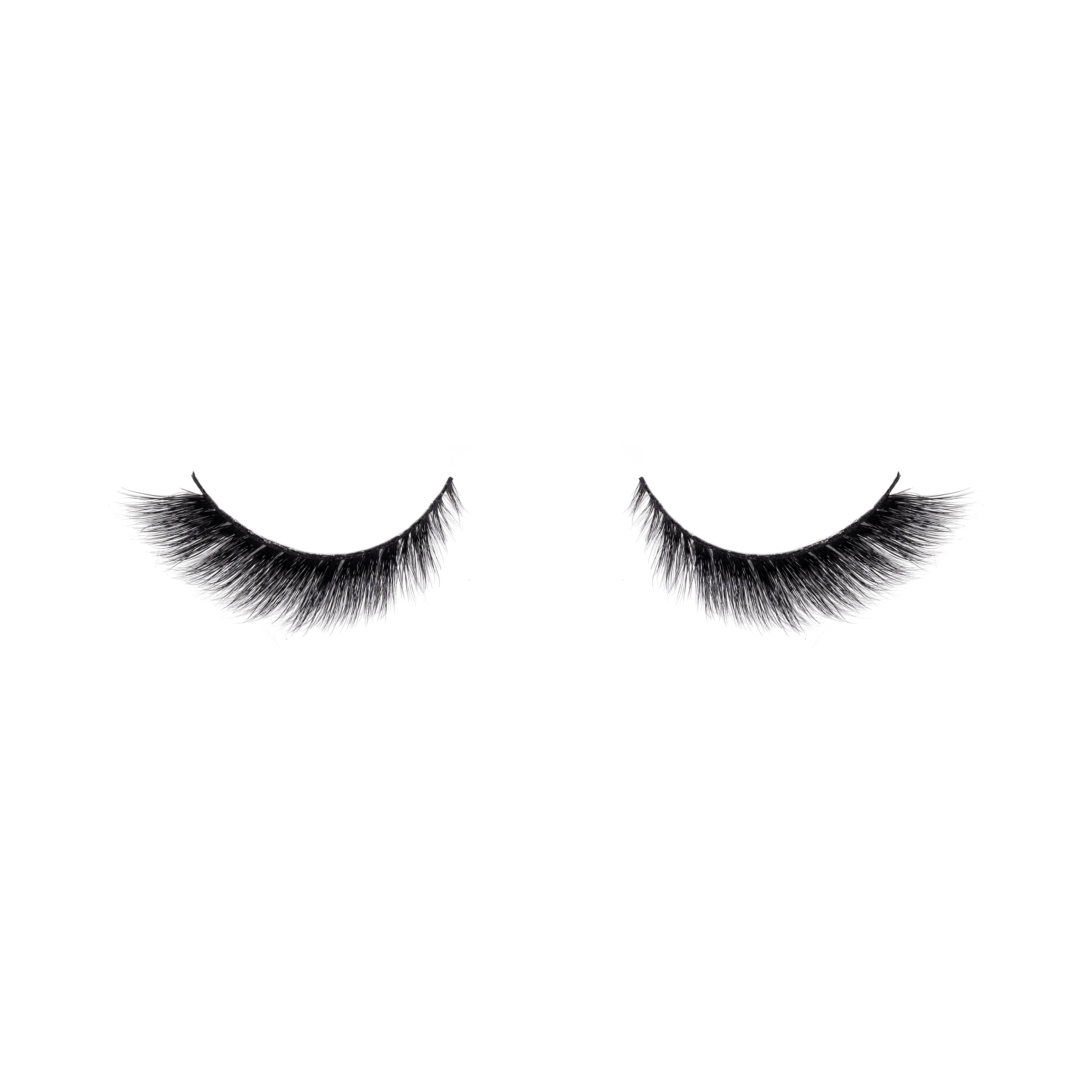 Pair of black false eyelashes on a white background
