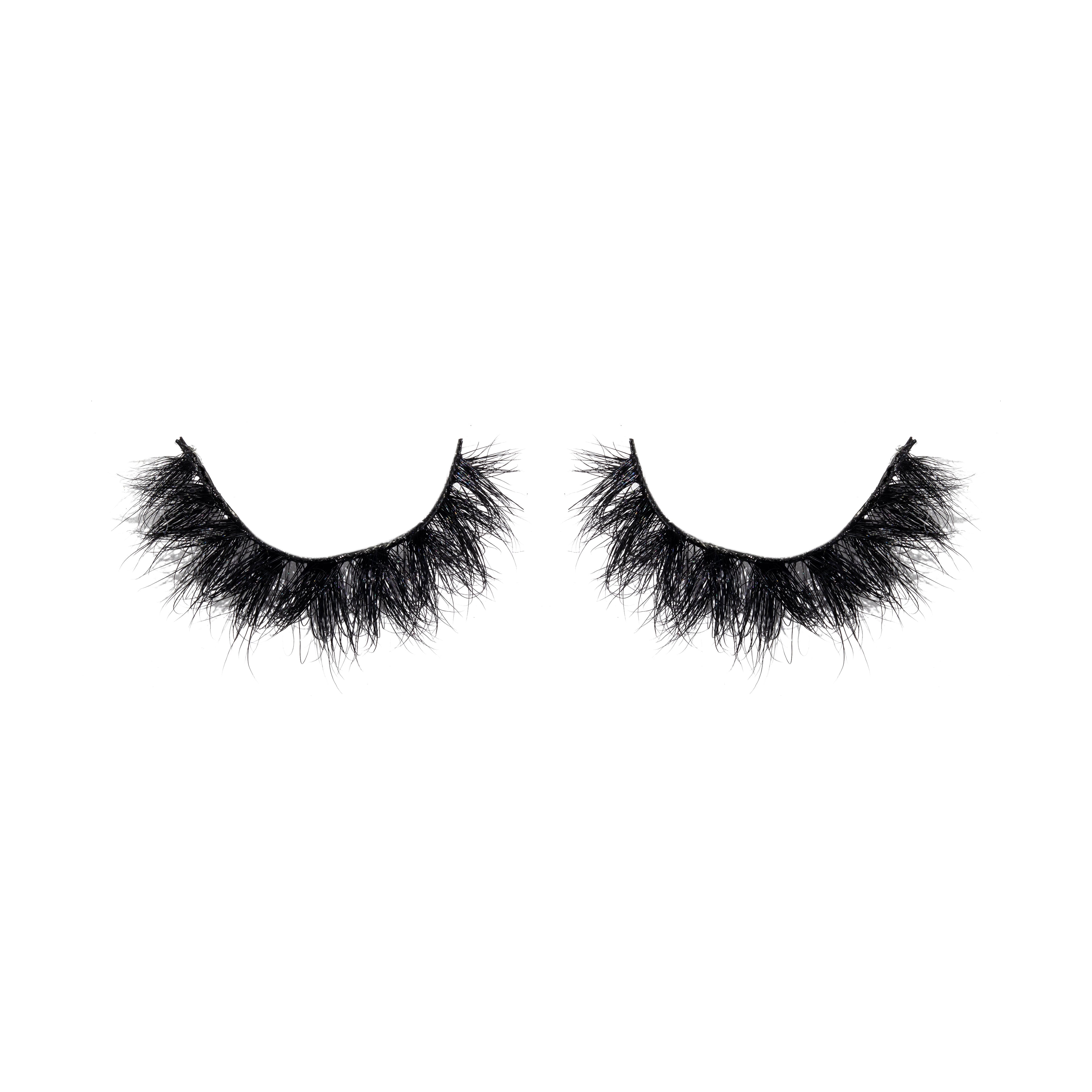 Pair of black false eyelashes on a white background