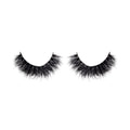 Pair of black false eyelashes on a white background