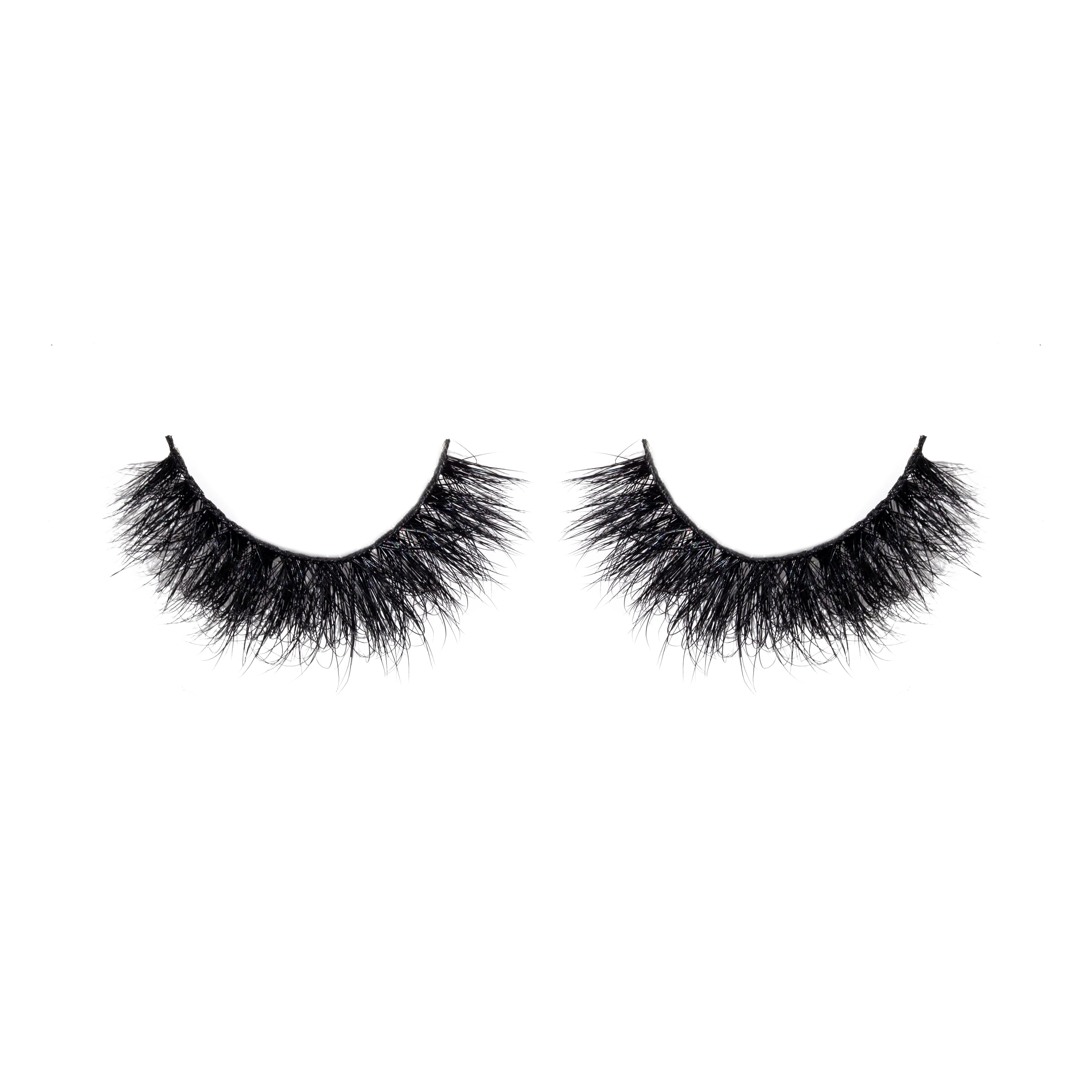 Pair of black false eyelashes on a white background