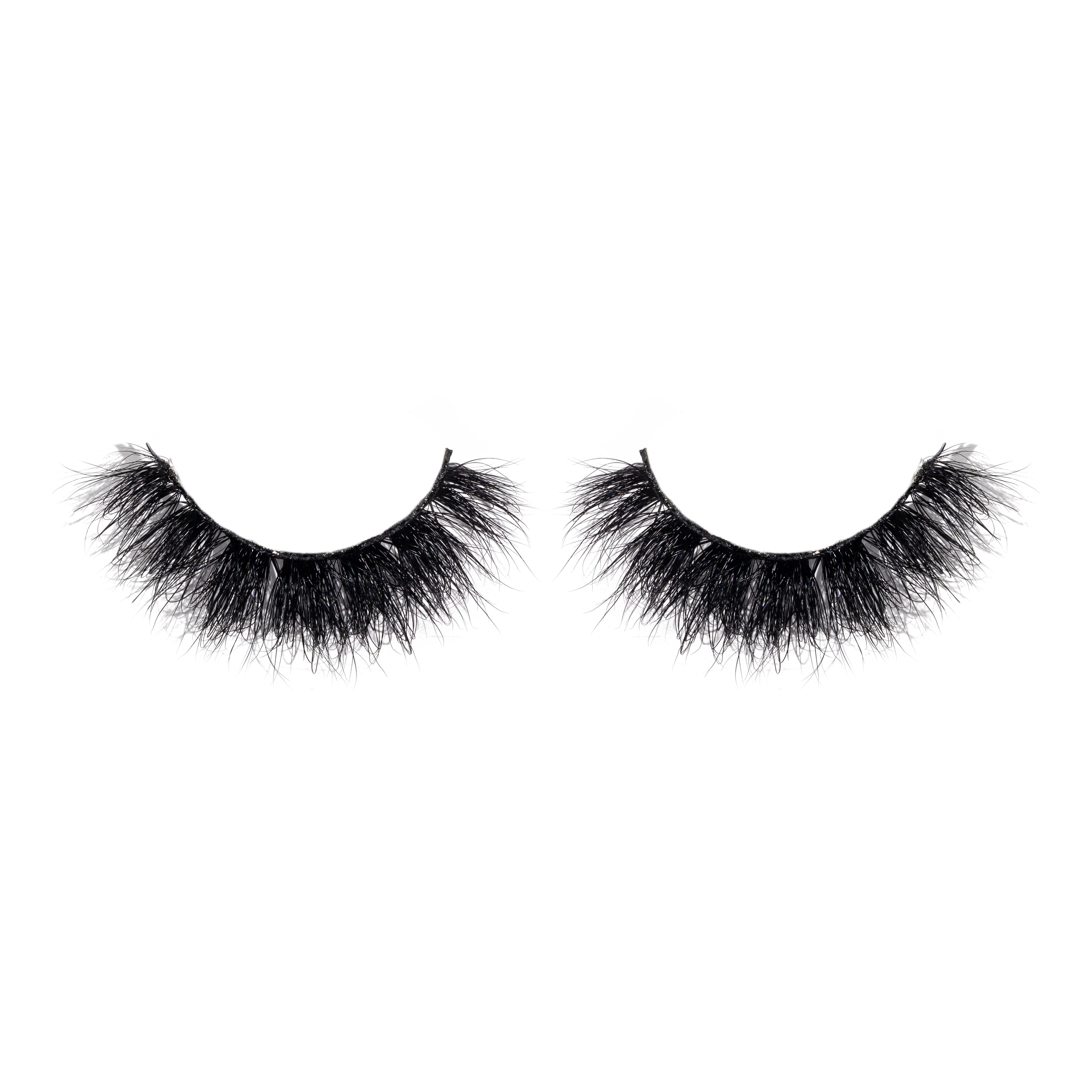 Pair of black false eyelashes on a white background
