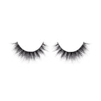 Pair of black false eyelashes on a white background