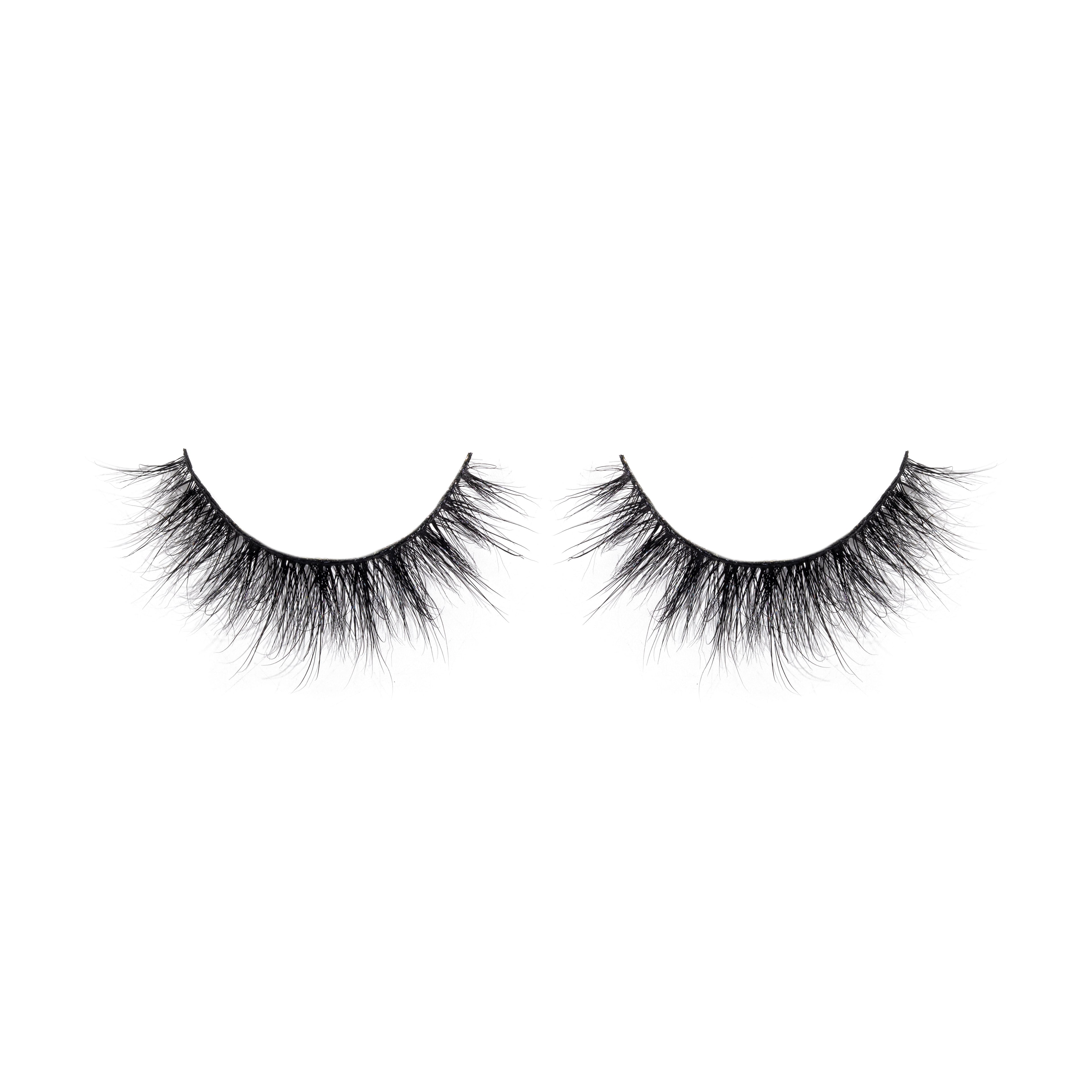 Pair of black false eyelashes on a white background