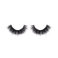Pair of black false eyelashes on a white background