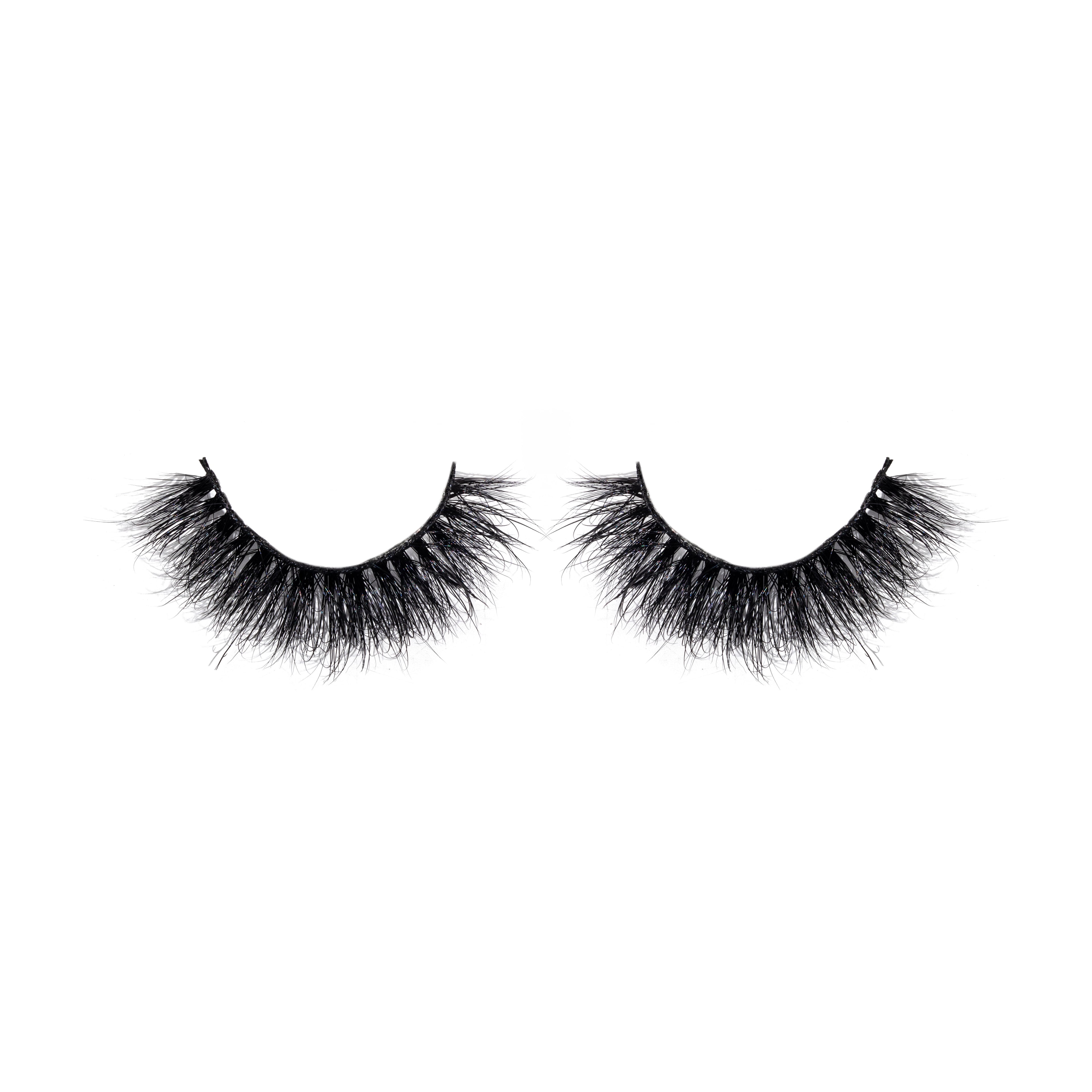 Pair of black false eyelashes on a white background