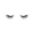 Pair of black false eyelashes on a white background