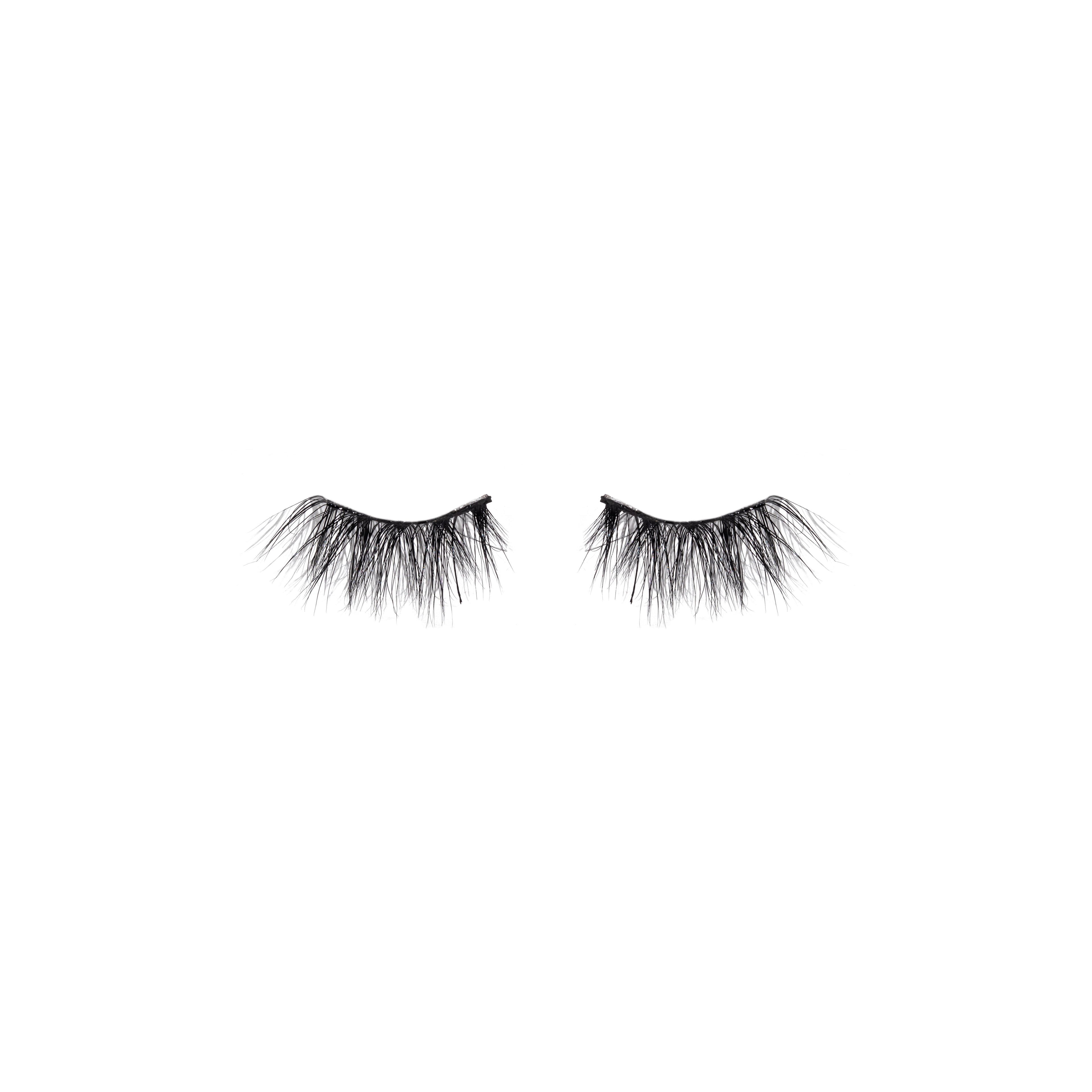 Pair of black false eyelashes on a white background