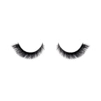 Pair of black false eyelashes on a white background